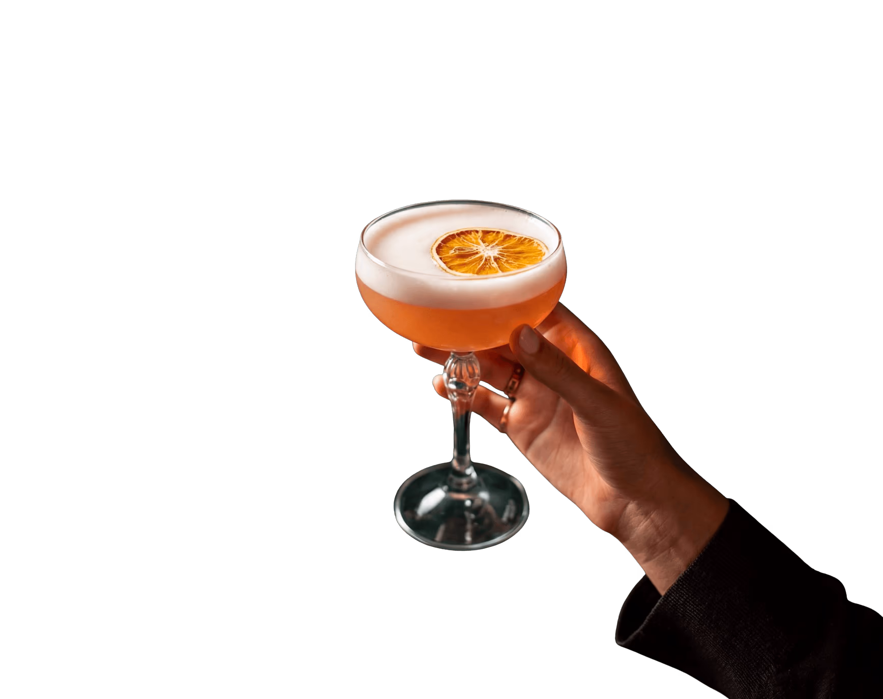 Hand holding a citrus cocktail at Citrus Grill & Lounge